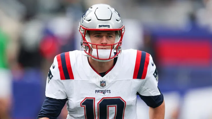 Mac Jones of the New England Patriots looks on prior to the game against the New York Giants.