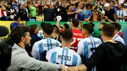 Lionel Messi trying to calm down the situation at Maracana Stadium.