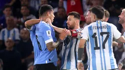Lionel Messi grabbing Mathias Olivera by the throat