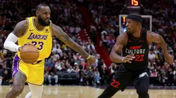 LeBron James drives against Jimmy Butler