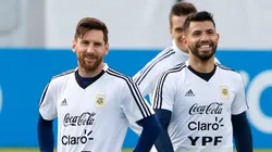 Lionel Messi and Sergio Aguero laugh during an open to public training session at Bronnitsy Training Camp on June 11, 2018