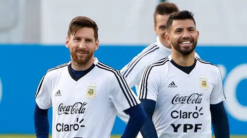 Lionel Messi and Sergio Aguero laugh during an open to public training session at Bronnitsy Training Camp on June 11, 2018