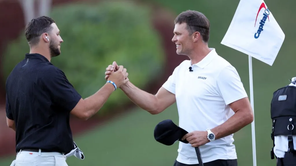 Josh Allen and Tom Brady embrace during Capital One's The Match VI - Brady &amp; Rodgers v Allen &amp; Mahomes at Wynn Golf Club on June 01, 2022
