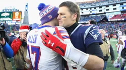 Josh Allen and Tom Brady meet on the field after the New England Patriots defeated the Buffalo Bills 24-12 at Gillette Stadium on December 23, 2018