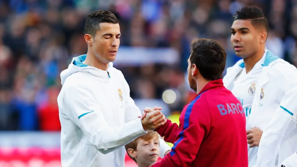 Cristiano Ronaldo greets Lionel Messi prior to a La Liga match between Real Madrid and Barcelona in 2017 