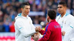Cristiano Ronaldo greets Lionel Messi prior to a La Liga match between Real Madrid and Barcelona in 2017