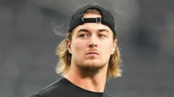 Kenny Pickett looks on before a game.