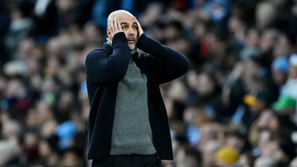 Pep Guardiola, Manager of Manchester City, reacts during the Premier League match between Manchester City and Crystal Palace at Etihad Stadium on December 16, 2023 in Manchester, England.