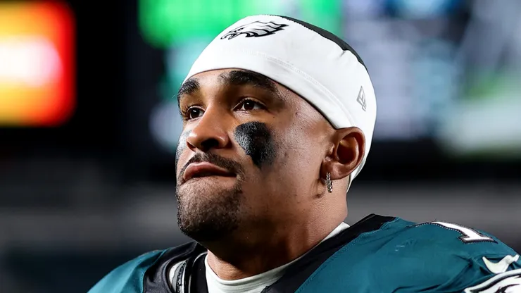 Jalen Hurts looks on during a game