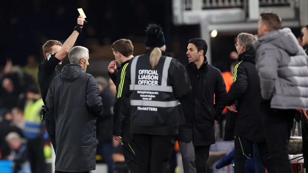 Mikel Arteta, manager of Arsenal receives a yellow card from referee Samuel Barrott for 