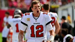 Tom Brady celebrating after scoring a touchdown.