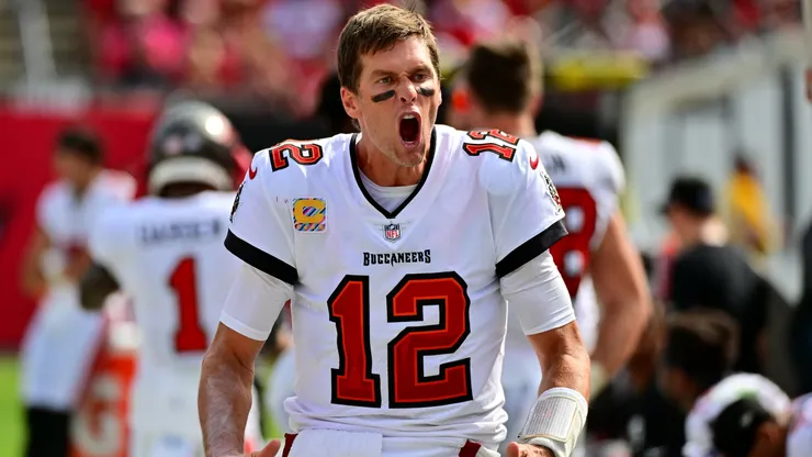 Tom Brady celebrating after scoring a touchdown.