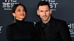 Antonela Roccuzzo and Lionel Messi pose for a photo on the Green Carpet ahead of The Best FIFA Football Awards 2022 on February 27, 2023 in Paris, France.