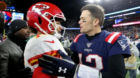 Tom Brady #12 of the New England Patriots talks with Patrick Mahomes #15 of the Kansas City Chiefs after the Chief defeat the Patriots 23-16 at Gillette Stadium on December 08, 2019 in Foxborough, Massachusetts.