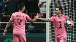 Lionel Messi and Luis Suarez celebrate.