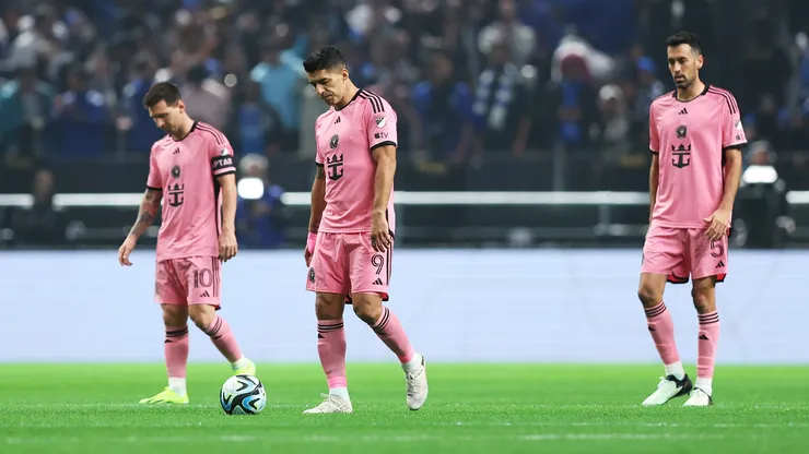 (L-R) Lionel Messi, Luis Suarez and Sergio Busquets of Inter Miami look dejected after conceding their team's second goal which was scored by Abdullah Al-Hamddan of Al Hilal (not pictured) during the Riyadh Season Cup match between Al Hilal and Inter Miami at Kingdom Arena on January 29, 2024 in Riyadh, Saudi Arabia.