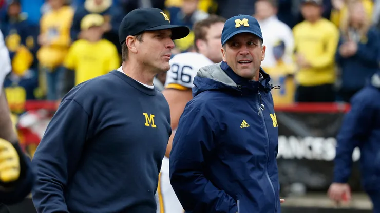 John and Jim Harbaugh during a game of the Michigan Wolverines in 2015
