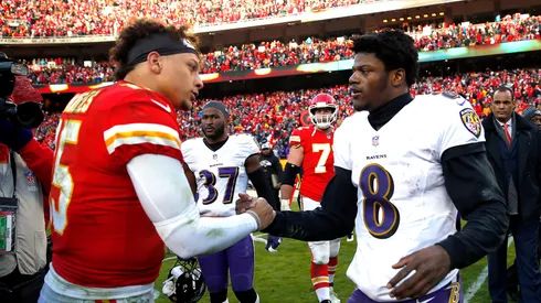 Quarterback Patrick Mahomes #15 of the Kansas City Chiefs shakes hands with quarterback Lamar Jackson #8 of the Baltimore Ravens after the Chiefs defeated the Ravens 27-24 in overtime to win the game at Arrowhead Stadium on December 09, 2018 in Kansas City, Missouri.