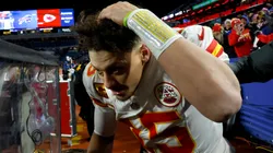 Patrick Mahomes #15 of the Kansas City Chiefs dodges snowballs thrown by fans after defeating the Buffalo Bills in the AFC Divisional Playoff game at Highmark Stadium on January 21, 2024 in Orchard Park, New York.