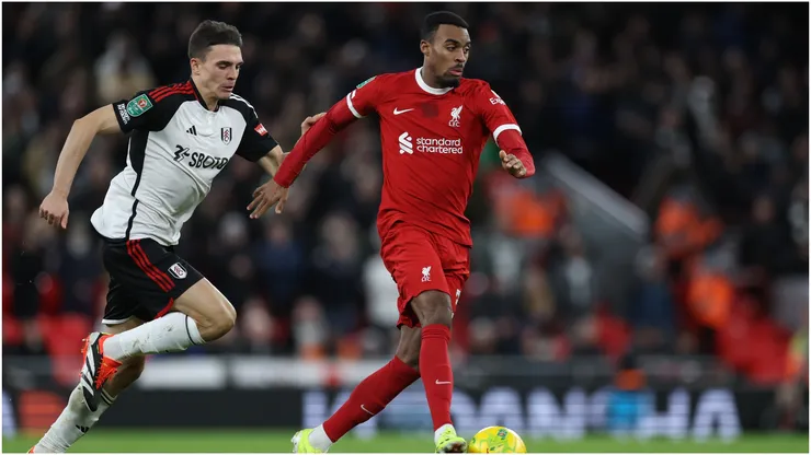 Ryan Gravenberch of Liverpool under pressure from Joao Palhinha of Fulham