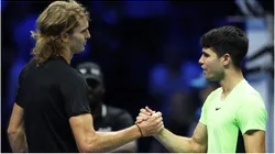 Alexander Zverev of Germany shakes hands at the net after his three set victory against Carlos Alcaraz of Spain