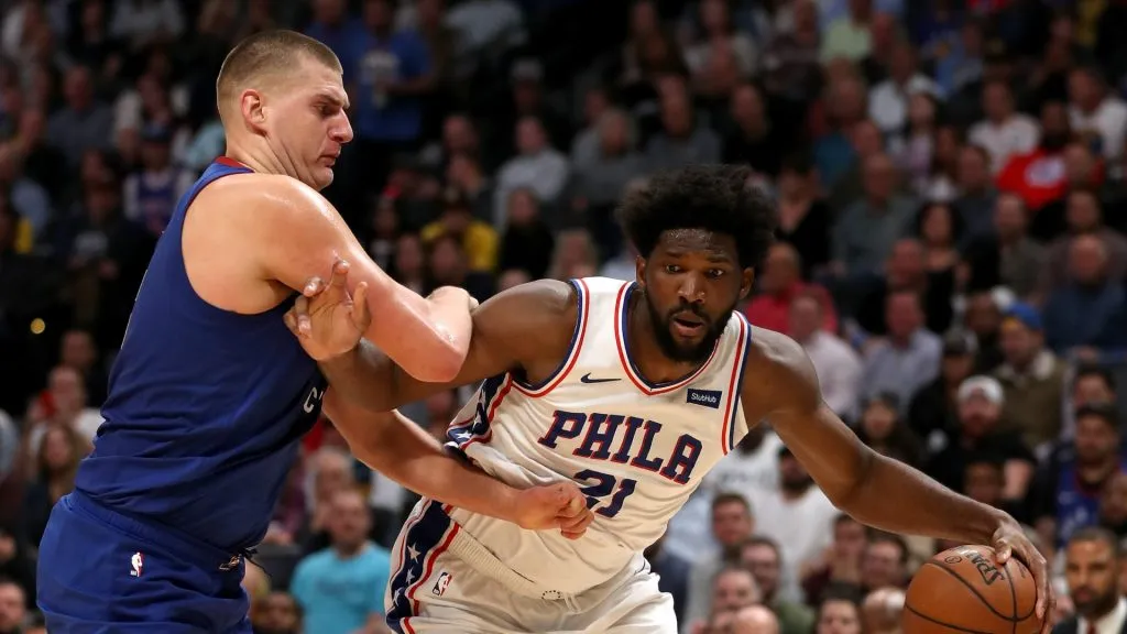 Nikola Jokic guarding Joel Embiid in 2019