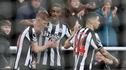 Alexander Isak of Newcastle United celebrates with teammates after scoring the team's first goal during the Premier League match between Newcastle United and Chelsea FC at St. James Park on November 25, 2023 in Newcastle upon Tyne, England.