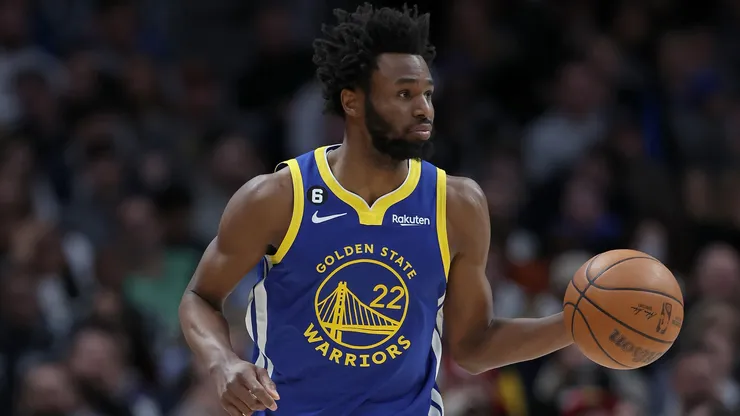 Andrew Wiggins dribbling a basketball.