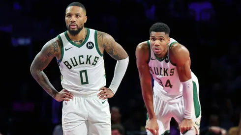 Damian Lillard and Giannis Antetokounmpo playing for the Milwaukee Bucks.