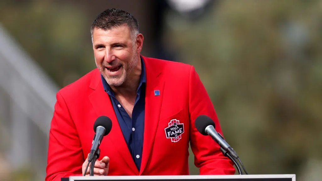 Former player Mike Vrabel speaks during a New England Patriots Hall of Fame induction ceremony during halftime of the game against the Buffalo Bills at Gillette Stadium on October 22, 2023 in Foxborough, Massachusetts.