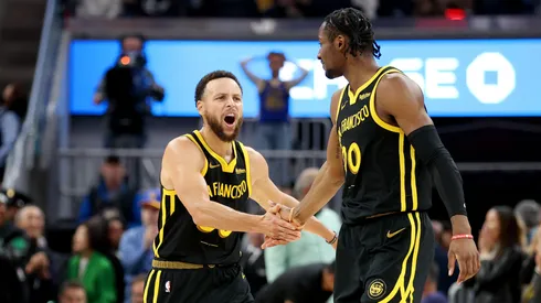 Stephen Curry and Jonathan Kuminga of the Golden State Warriors.