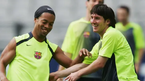 Ronaldinho with Lionel Messi during a Barcelona practice