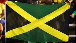 A fan waves a Jamaica flag