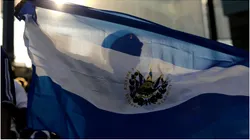 El Salvador fan waves a flag