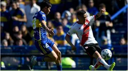 Esequiel Barco of River Plate fights for the ball with Jorman Campuzano of Boca Juniors