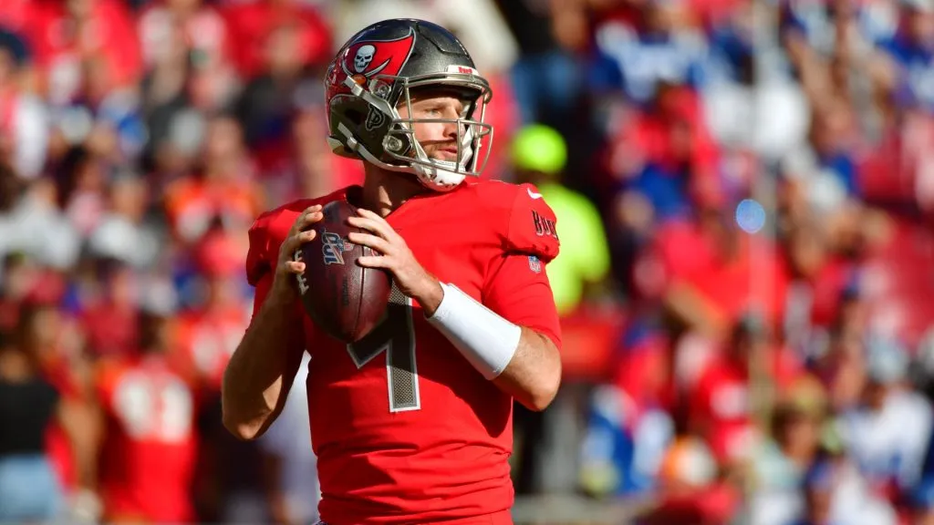 Ryan Griffin #4 of the Tampa Bay Buccaneers drops back to throw a pass for the first time in the NFL during the third quarter of a game against the Indianapolis Colts at Raymond James Stadium on December 08, 2019 in Tampa, Florida.