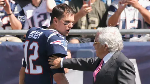 Tom Brady #12 of the New England Patriots speaks with owner Robert Kraft before a game against the Houston Texans at Gillette Stadium on September 24, 2017 in Foxboro, Massachusetts.