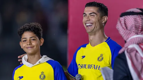 Cristiano Ronaldo and his son Cristiano Ronaldo Jr greet the crowd during the official unveiling of Cristiano Ronaldo as an Al Nassr player at Mrsool Park Stadium on January 3, 2023 in Riyadh, Saudi Arabia.