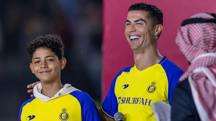 Cristiano Ronaldo and his son Cristiano Ronaldo Jr greet the crowd during the official unveiling of Cristiano Ronaldo as an Al Nassr player at Mrsool Park Stadium on January 3, 2023 in Riyadh, Saudi Arabia.