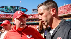 Head coach Andy Reid of the Kansas City Chiefs and head coach Kyle Shanahan of the San Francisco 49ers speak after the game at midfield at Arrowhead Stadium on September 23rd, 2018 in Kansas City, Missouri.