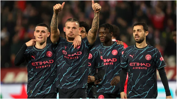 Kalvin Phillips of Manchester City celebrates with teammate