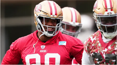 Kevin Givens #90 looks on during San Francisco 49ers practice ahead of Super Bowl LVIII