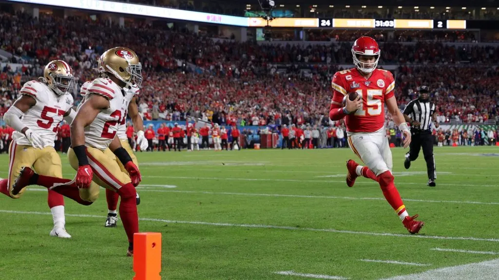 Patrick Mahomes #15 of the Kansas City Chiefs runs with the ball against the San Francisco 49ers in Super Bowl LIV at Hard Rock Stadium on February 02, 2020 in Miami, Florida.
