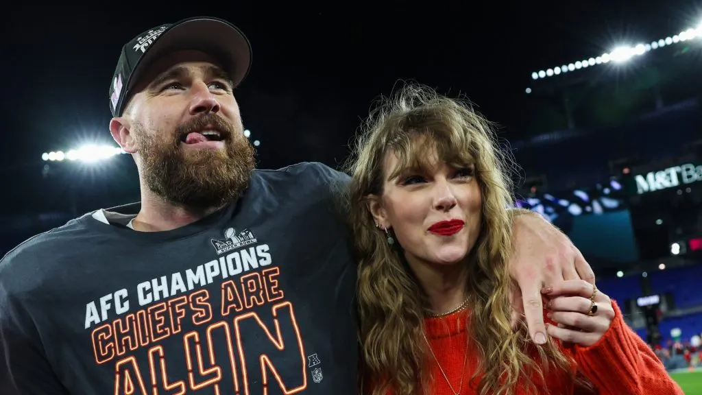 Travis Kelce #87 of the Kansas City Chiefs (L) celebrates with Taylor Swift after defeating the Baltimore Ravens in the AFC Championship Game at M&amp;T Bank Stadium on January 28, 2024 in Baltimore, Maryland.