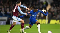 Noni Madueke of Chelsea is grabbed by Alex Moreno of Aston Villa
