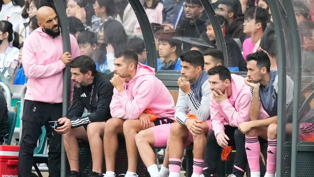 Messi watching Inter Miami's friendly in Hong Kong on the bench.