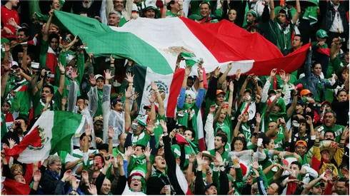Mexican fans perform a Mexican wave