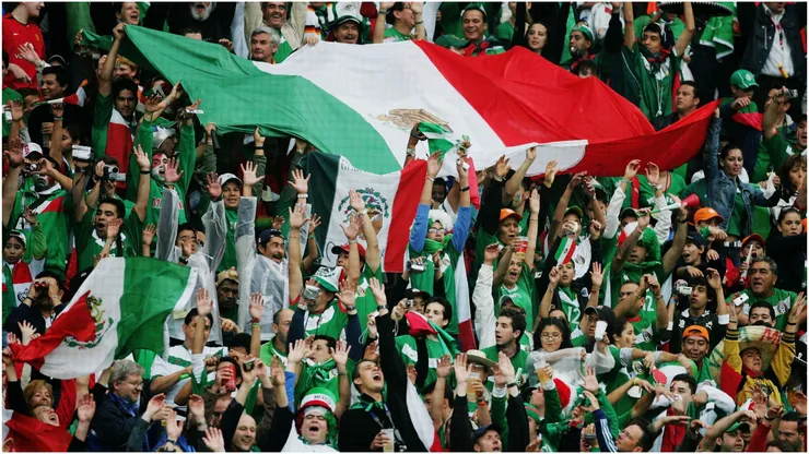 Mexican fans perform a Mexican wave