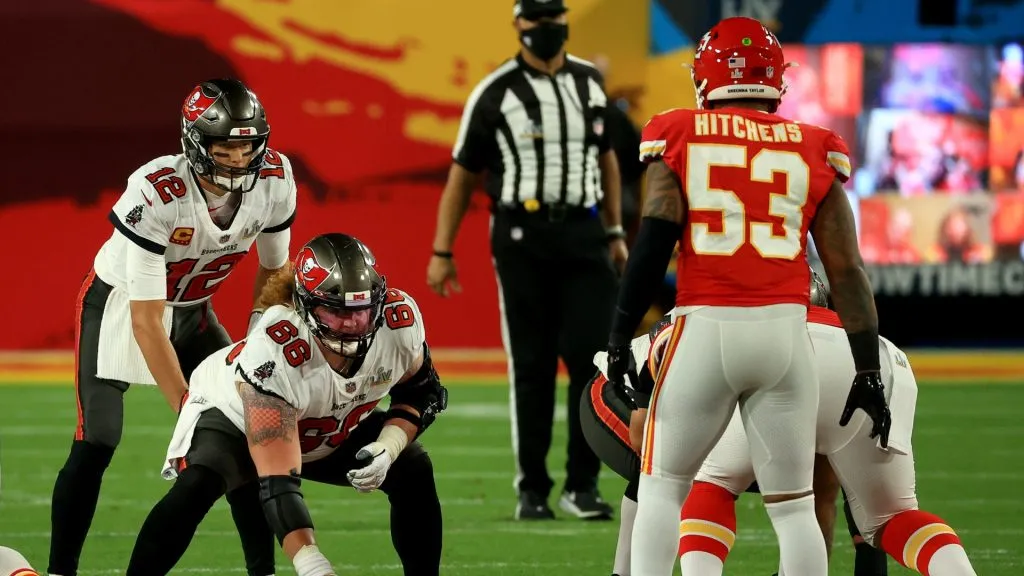  Ryan Jensen #66 of the Tampa Bay Buccaneers waits to snap to Tom Brady #12 during the second quarter in Super Bowl LV at Raymond James Stadium on February 07, 2021 in Tampa, Florida.