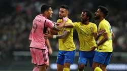 Luis Suarez of Inter Miami clashes with Alex Telles, Abdulmajeed Al Sulaiheem and Nawaf Mashari Abdulrahman Boushal of Al-Nassr during the Riyadh Season Cup match between Al-Nassr and Inter Miami at Kingdom Arena on February 01, 2024 in Riyadh, Saudi Arabia.